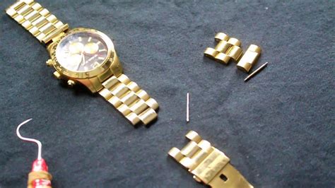 how to take links off a michael kors watch